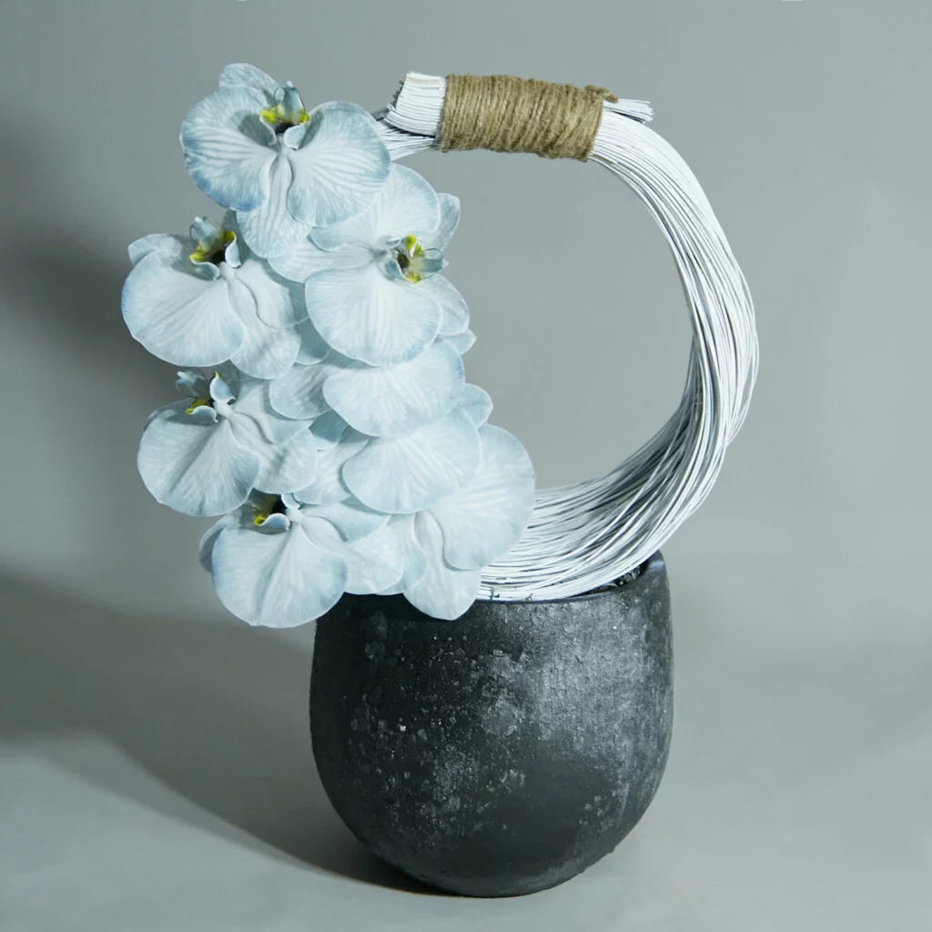 modern blue orchids arrangement