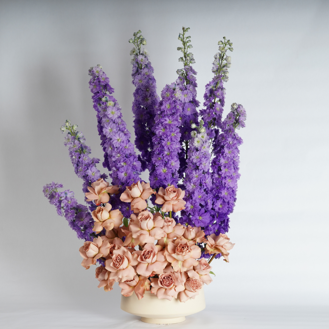 Delphinium and roses flower arrangement