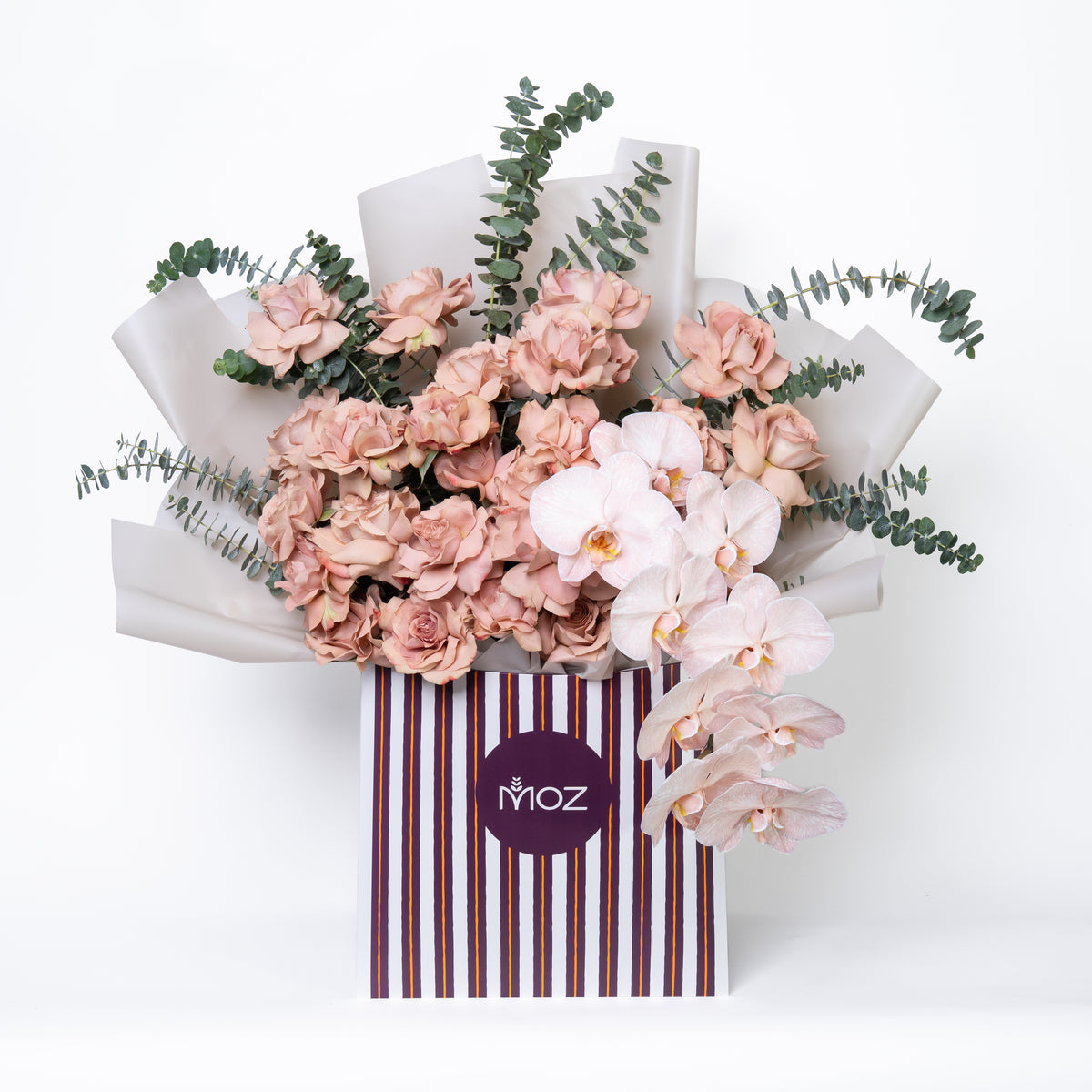 Lilt | Latte Roses, Peach Orchids  & Eucalyptus Leaves