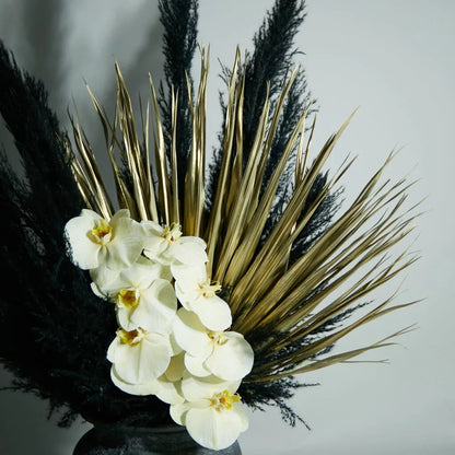 Characteristic | Black Pampas, Cream Orchids & Gold leaves Flower Arrangement