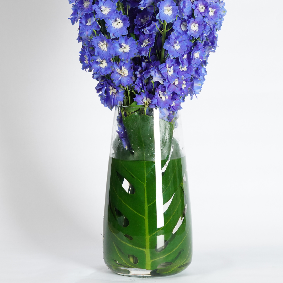 blue and green flower arrangement 