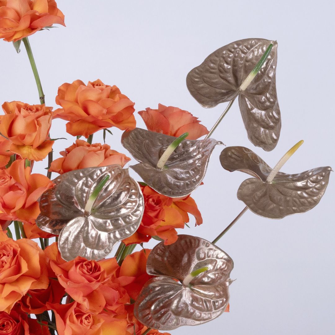 Metalic Tangerine | Orange Roses & Golden Anthirium Flower arrangement
