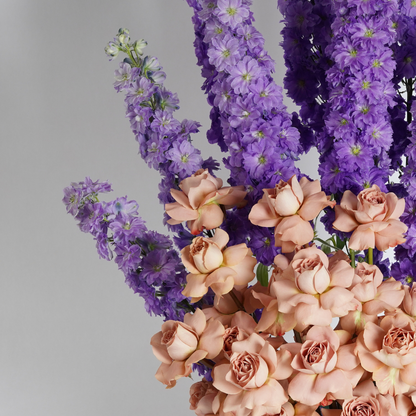 Delphinium and roses flower arrangement 