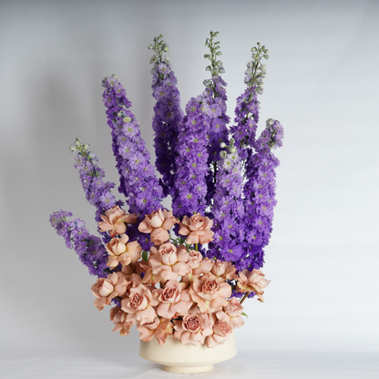 Delphinium and roses flower arrangement 